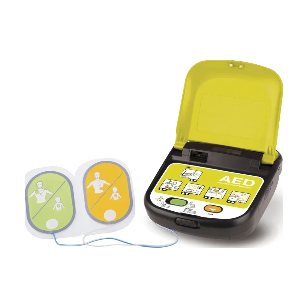 Desfibrilador Tecnoheart Plus abierto con los electrodos adulto y pediátricos